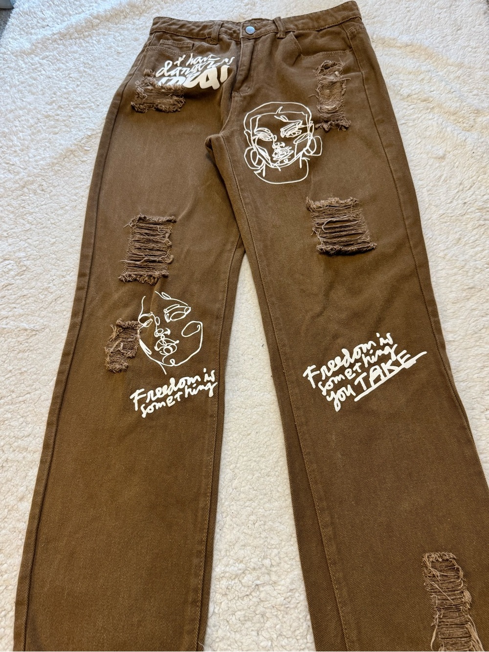 SHEIN Brown Distressed Jeans with White Graphic Prints